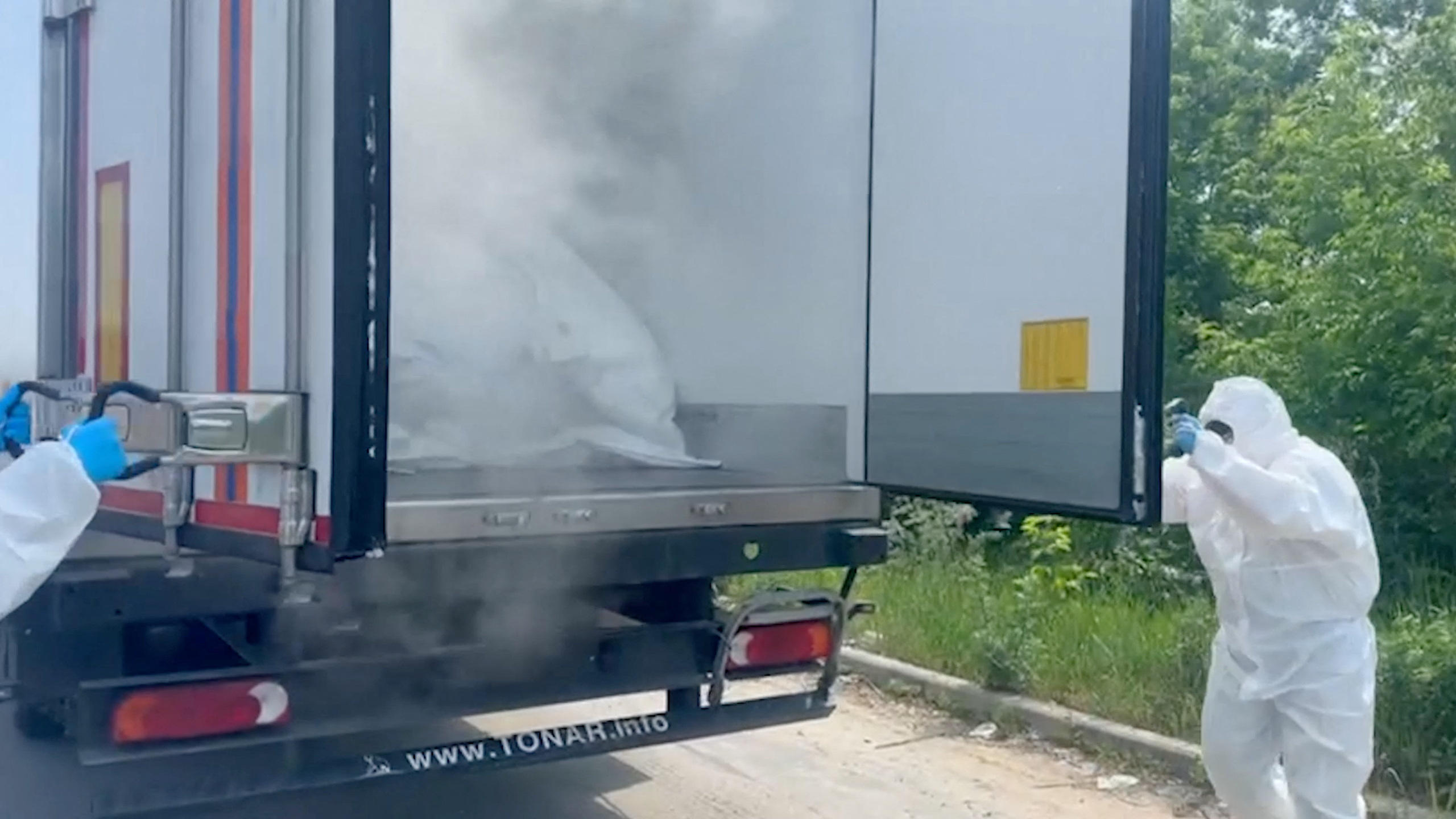 A still image from a video released by Russia's Defence Ministry shows what it said to be lorries with bodies of Ukrainian service members to be handed over to Ukraine, at an unidentified location