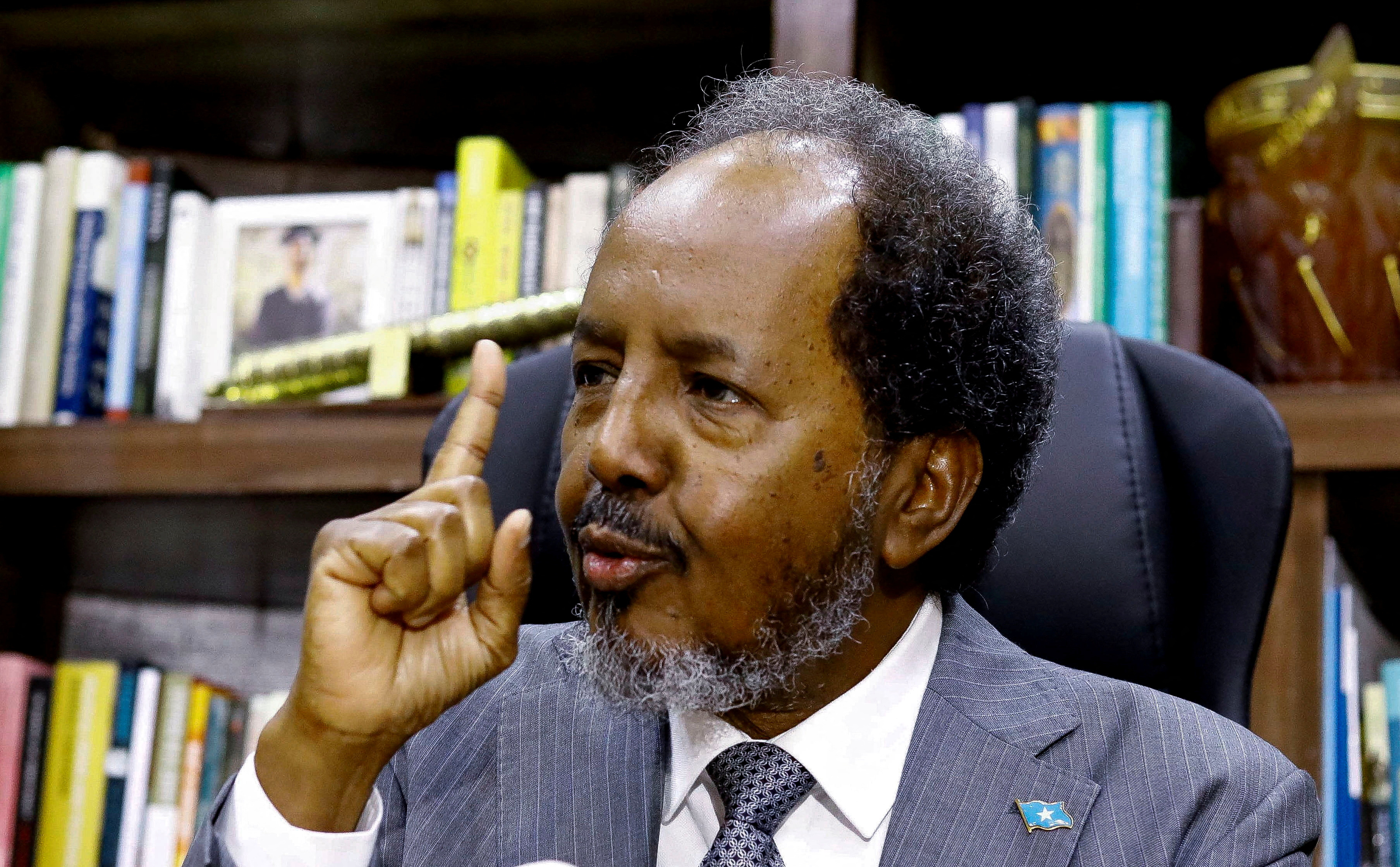FILE PHOTO: Somalia's President Hassan Sheikh Mohamud speaks during an interview with Reuters, in his office in Mogadishu