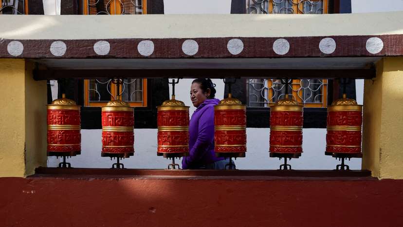 Tibetans in Nepal offer prayers at a monastery in memory of those killed in the recent earthquake, at the Tibetan Refugee Camp in Lalitpur