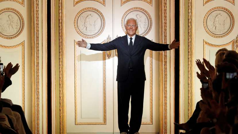 FILE PHOTO: Italian designer Giorgio Armani acknowledges the applause at the end of his Haute Couture Fall/Winter 2017/2018 collection show in Paris