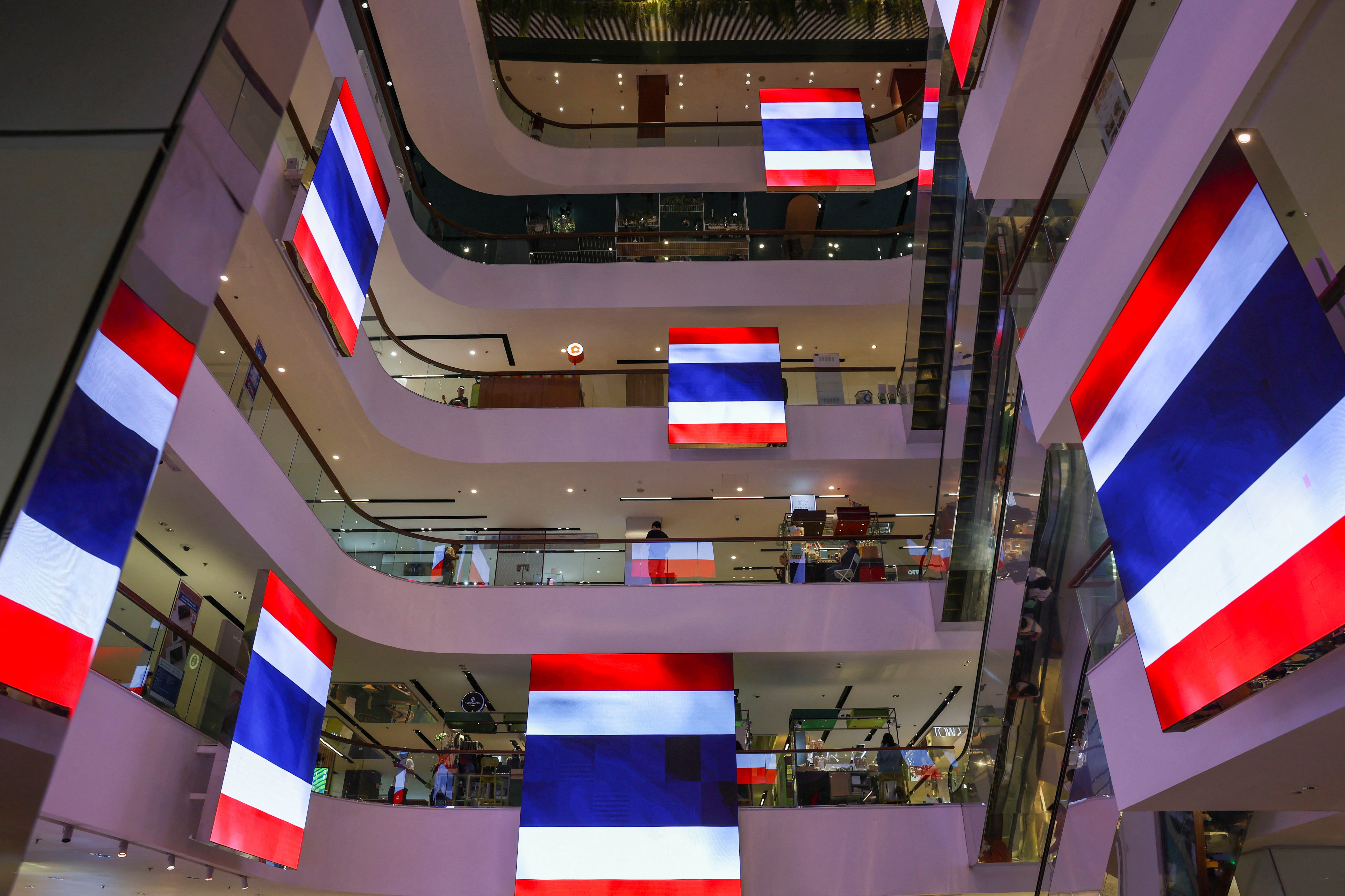 Digital screens with Thai national flags in support of the country in Bangkok