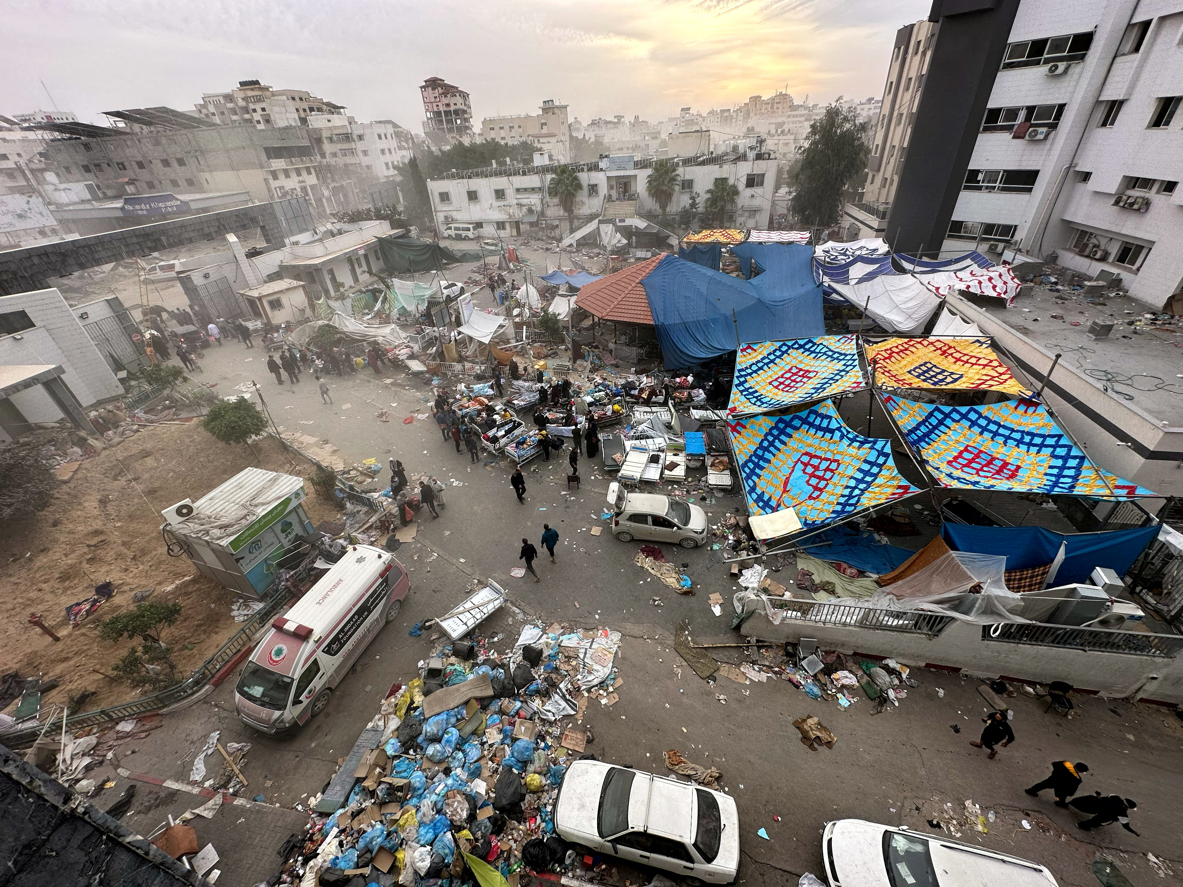 Palestinians inspect Al Shifa Hospital, in Gaza City