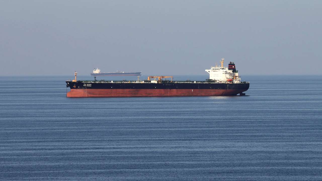 Oil tankers pass through the Strait of Hormuz
