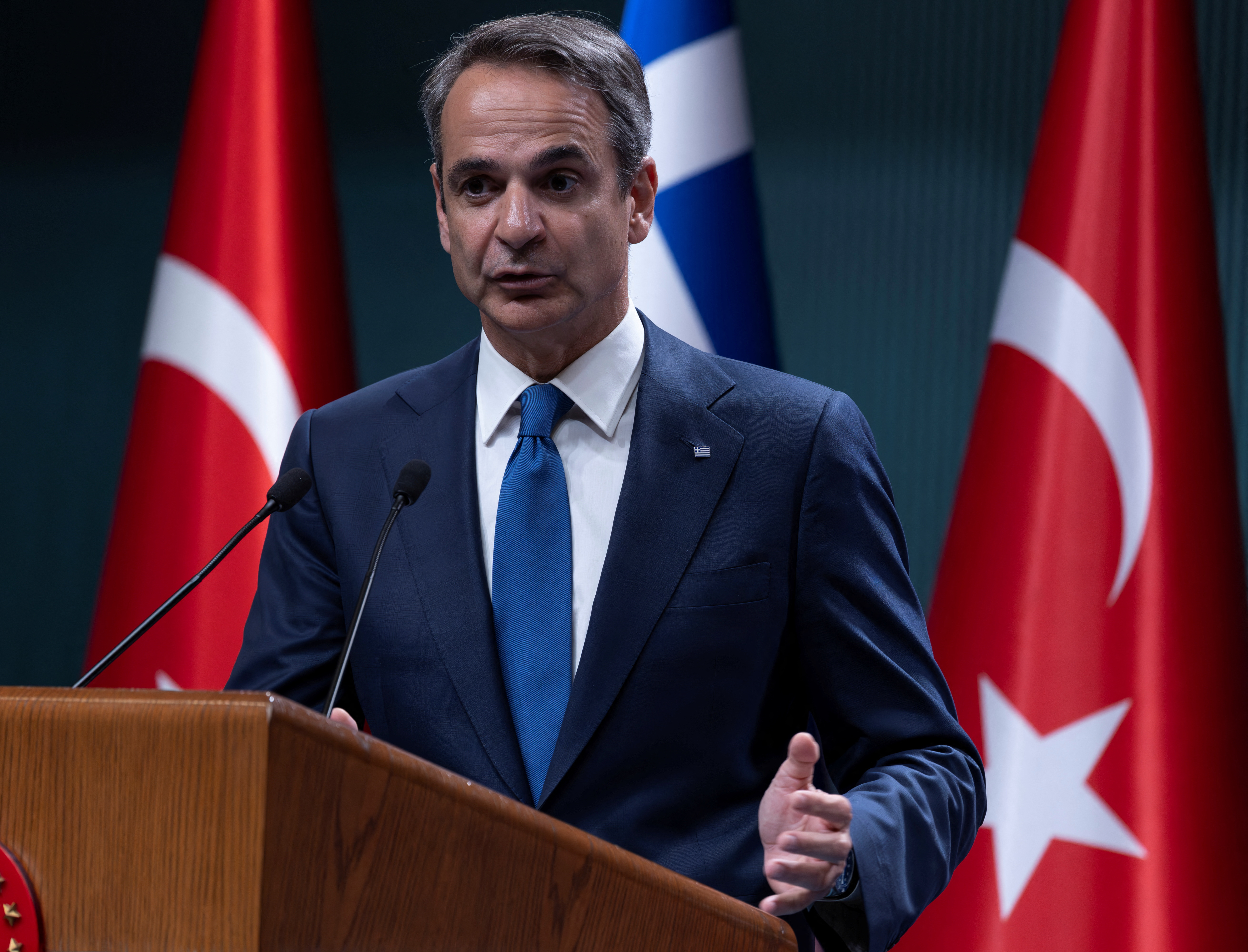 Turkey's President Tayyip Erdogan and Greek Prime Minister Kyriakos Mitsotakis attend a press conference in Ankara