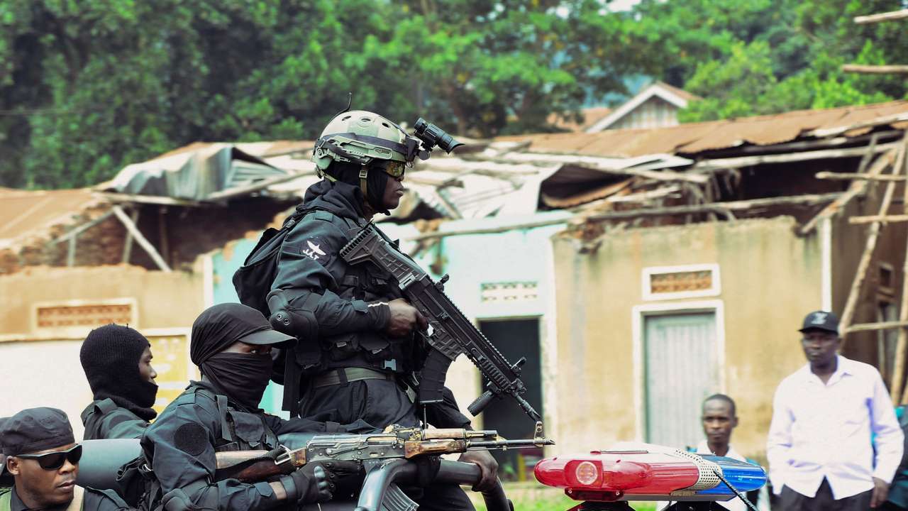 Police and troops block Ugandan opposition NUP's headquarters ahead of protest, in Kampala