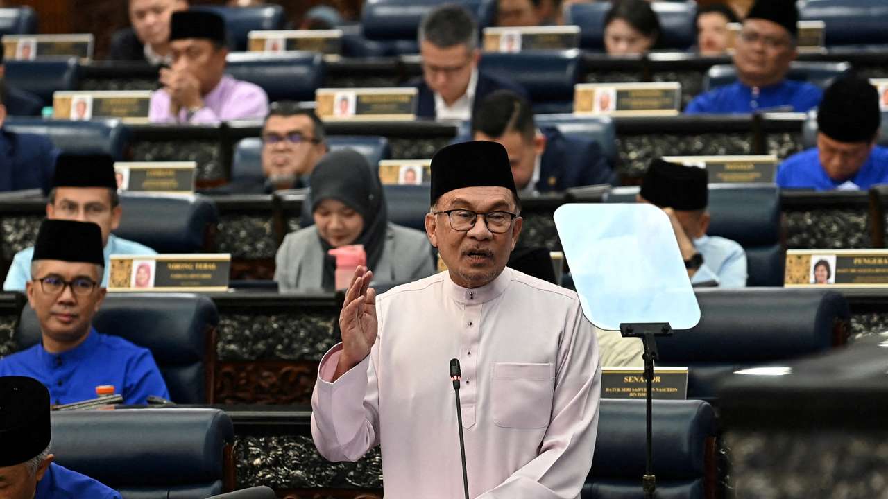 Malaysia's Prime Minister and Finance Minister Anwar Ibrahim tables the 2024 Malaysia's budget at Kuala Lumpur