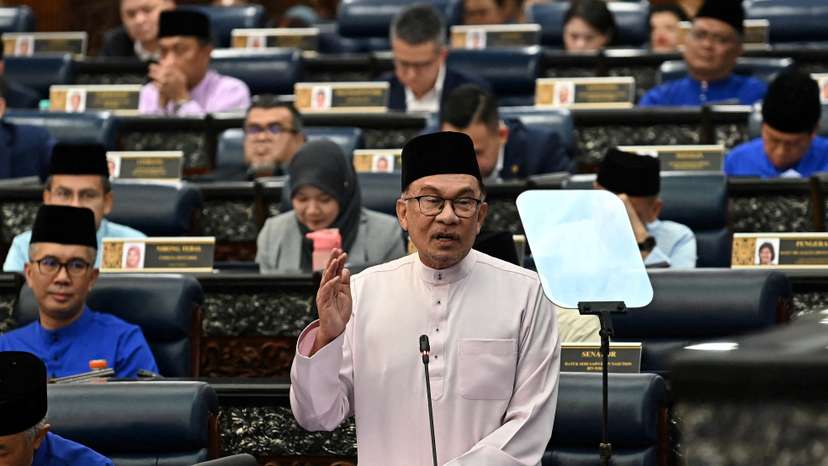 Malaysia's Prime Minister and Finance Minister Anwar Ibrahim tables the 2024 Malaysia's budget at Kuala Lumpur