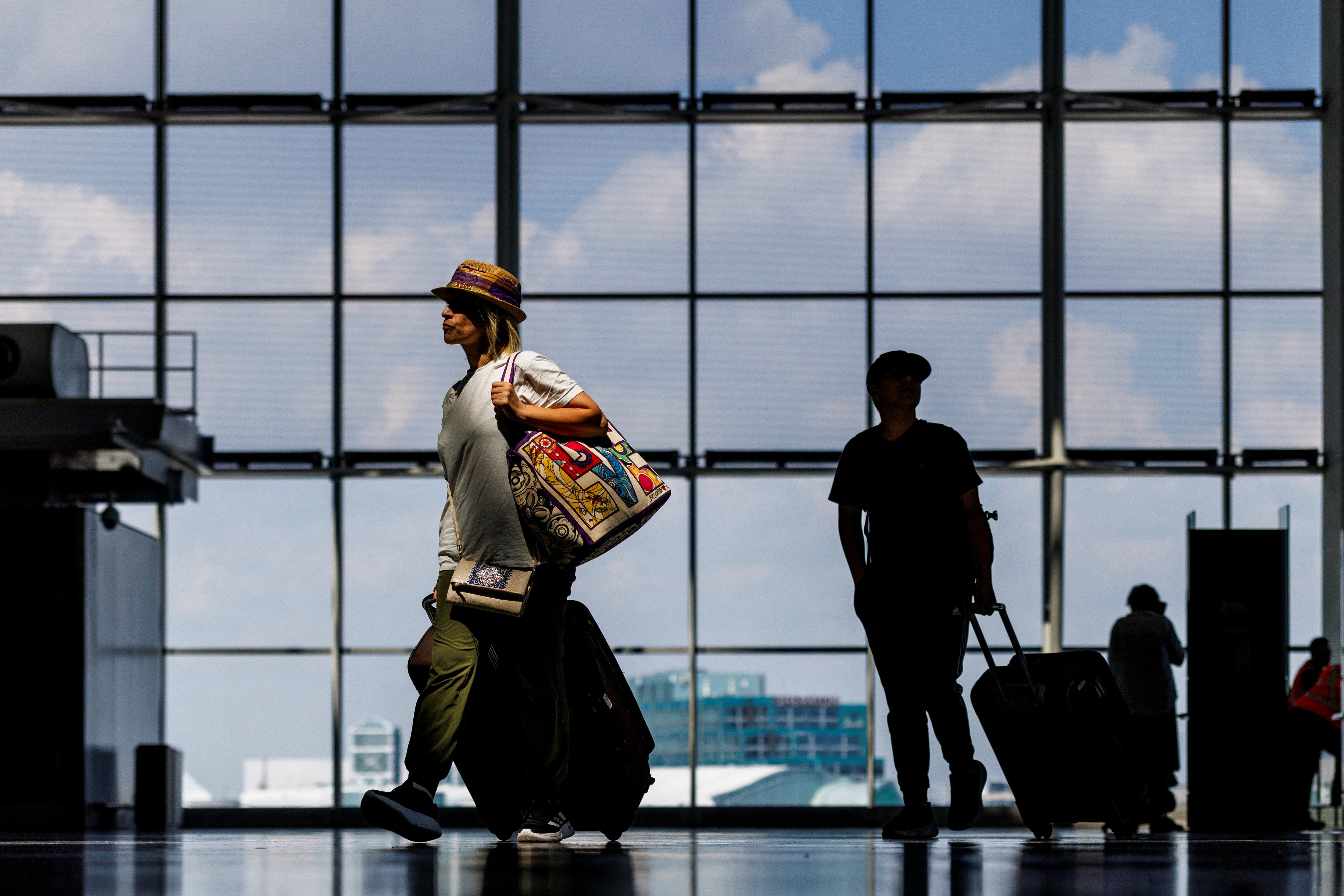Travellers at Pearson International Airport in Mississauga, Ontario