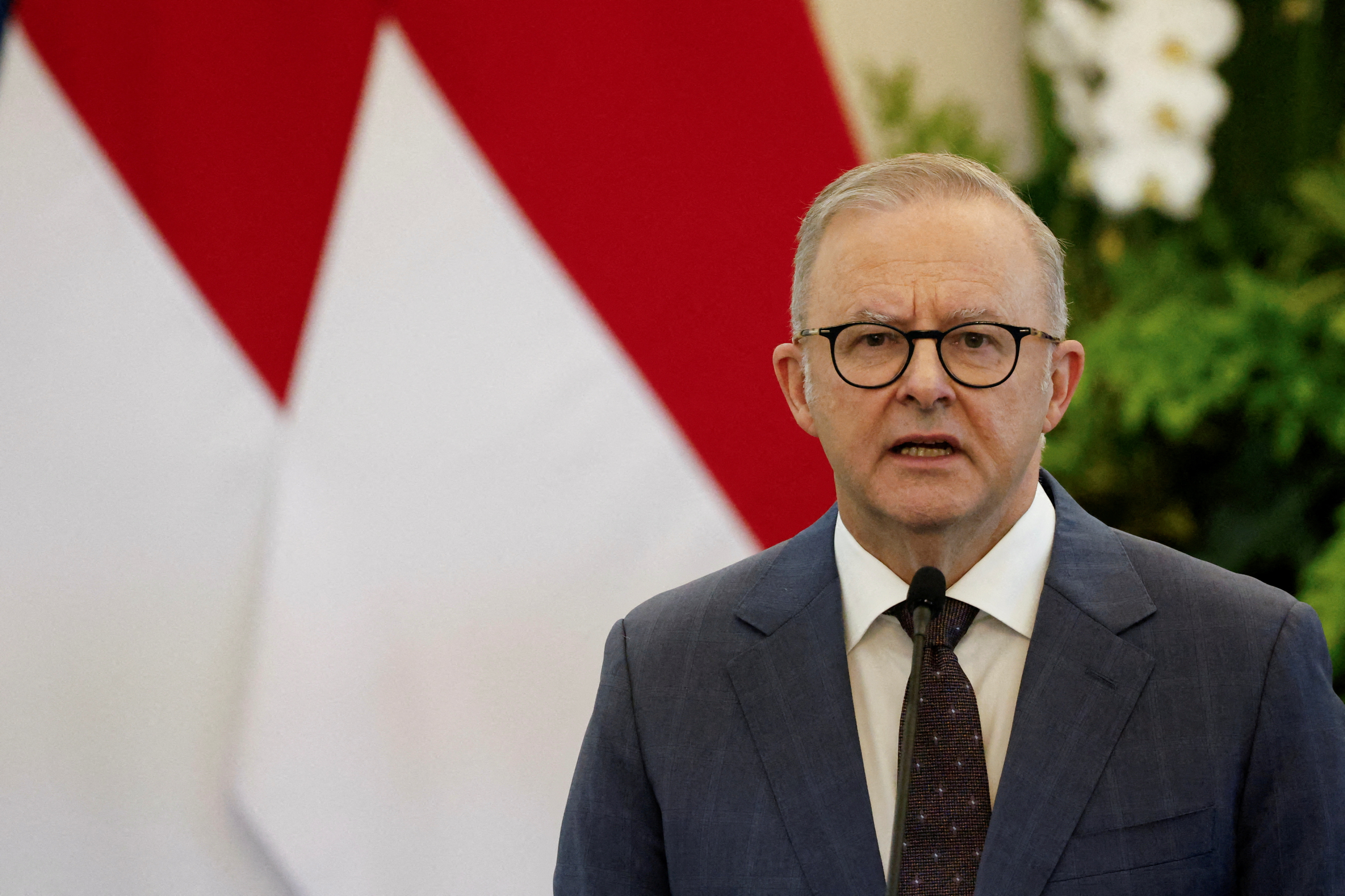 FILE PHOTO: Australia's Prime Minister Anthony Albanese speaks during a press conference with Indonesian President Prabowo Subianto (not pictured) at the Merdeka Palace in Jakarta