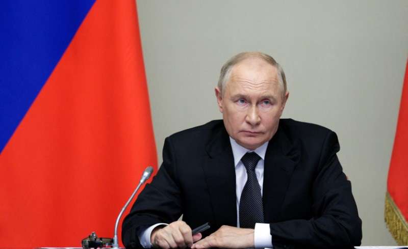 Russia's President Putin chairs a meeting with security officials and regional governors outside Moscow