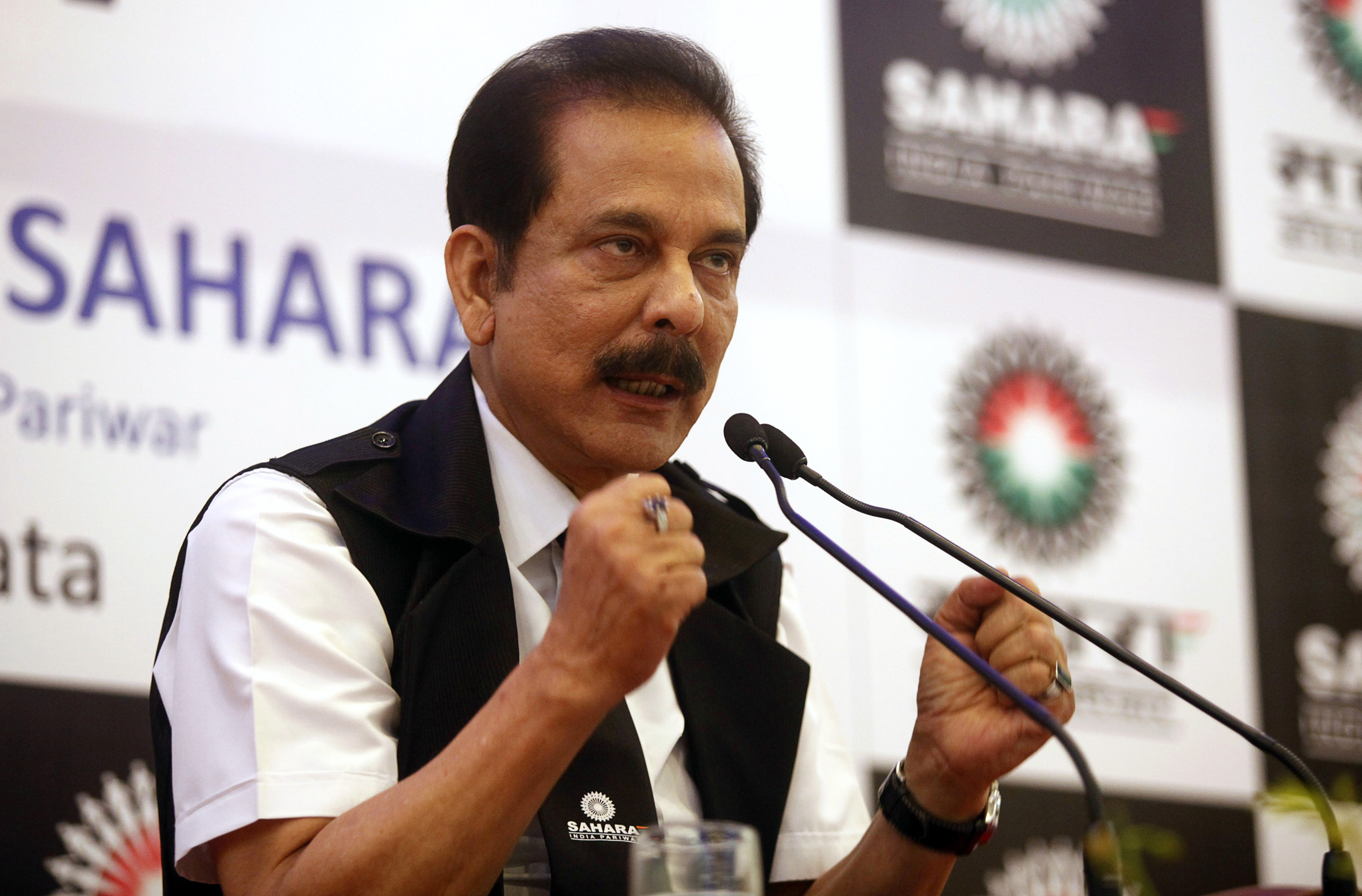 FILE PHOTO: Sahara Group Chairman Subrata Roy gestures as he speaks during a news conference in Kolkata