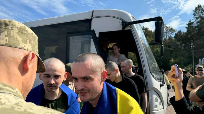 Ukrainian POWs are seen after a swap at an unknown location in Ukraine