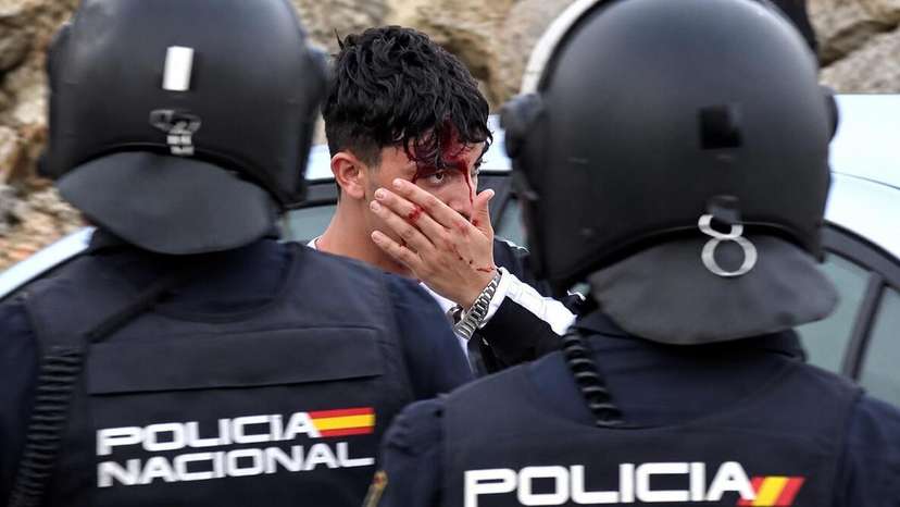Police Struggle As Migrants Rush Ceuta Camp