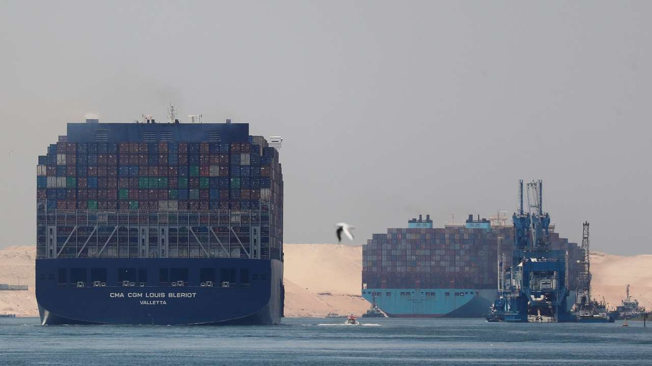 FILE PHOTO: Container ships in Suez Canal