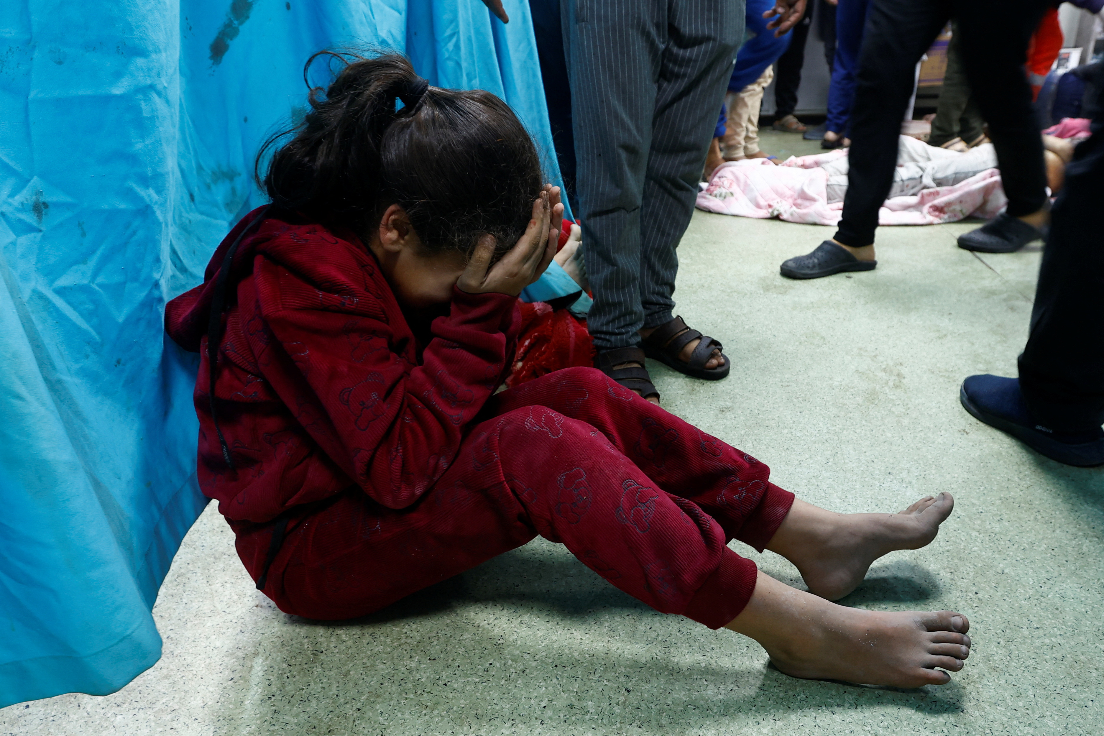 Wounded Palestinians are rushed into Nasser hospital, in Khan Younnis