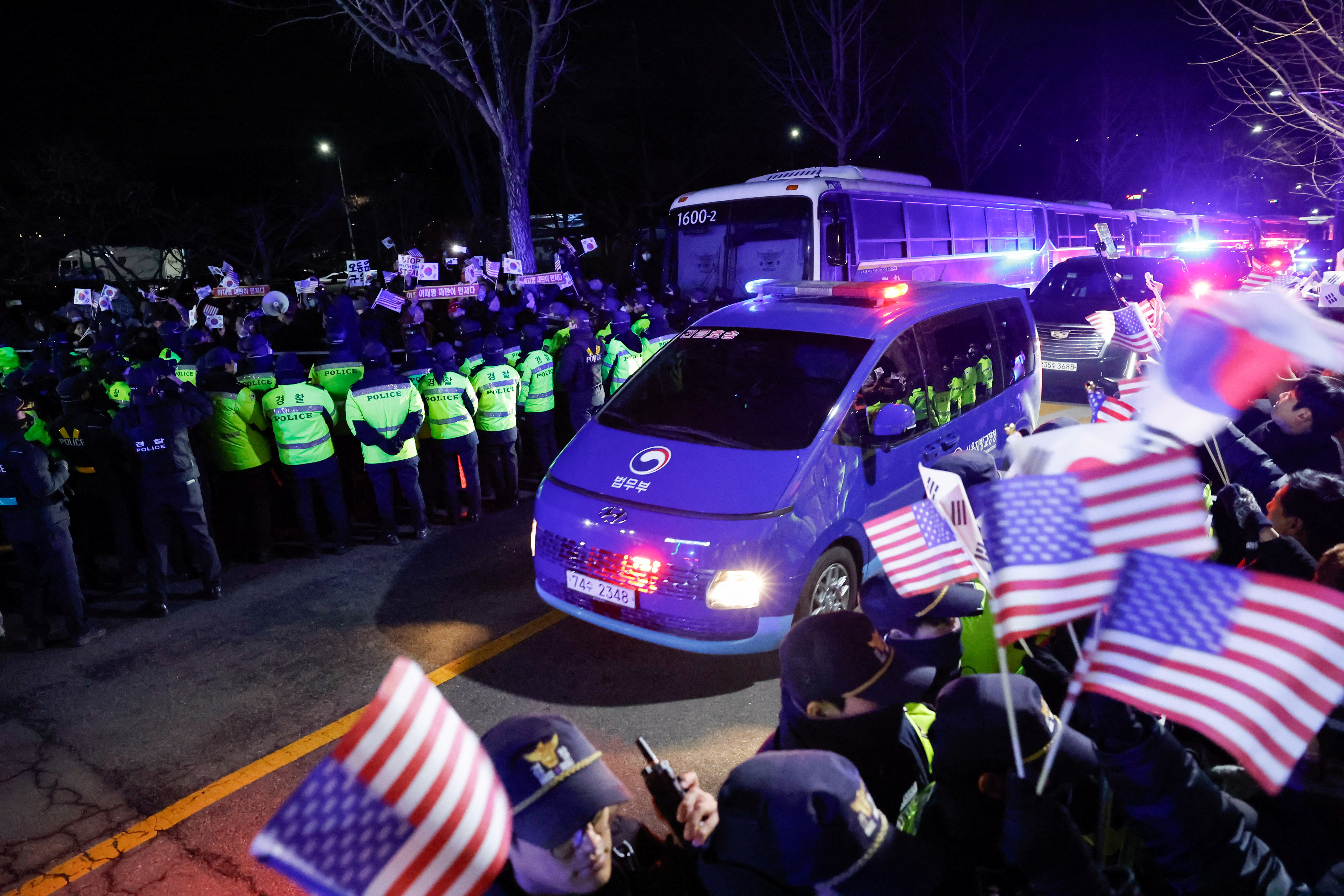 Scenes from outside the Seoul Detention Center in Uiwang
