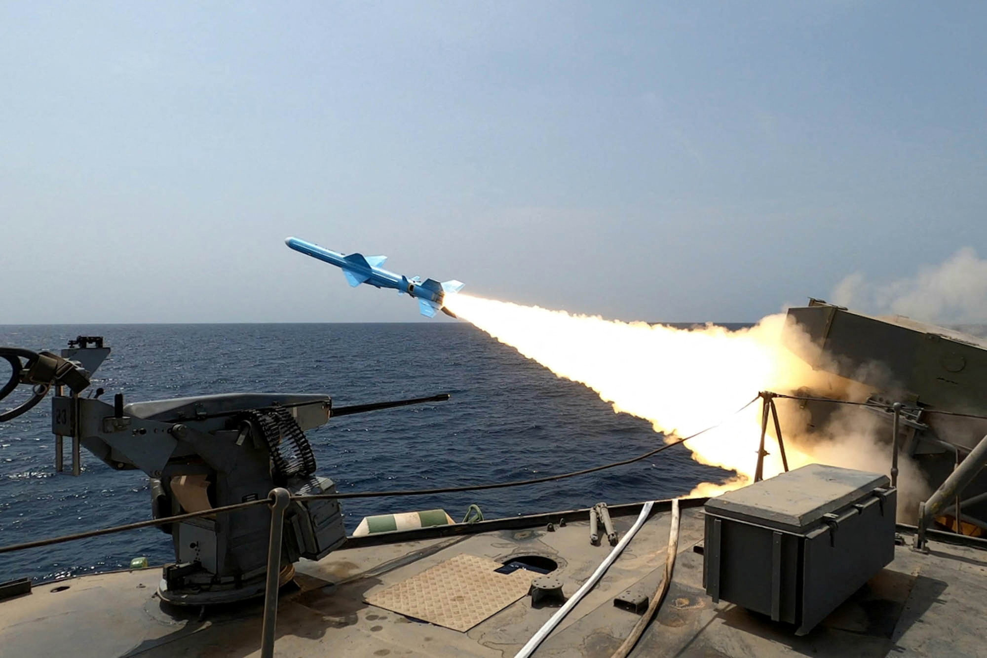 An Iranian missile is launched during a military exercise in an undisclosed location in Iran
