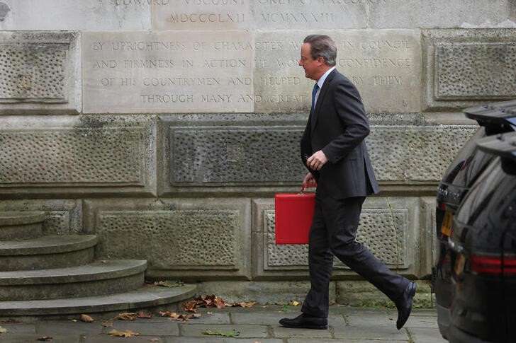 Britain's Foreign Secretary David Cameron arrives at the Foreign, Commonwealth and Development Office