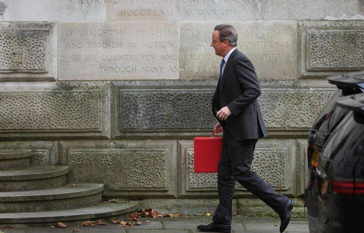 Britain's Foreign Secretary David Cameron arrives at the Foreign, Commonwealth and Development Office