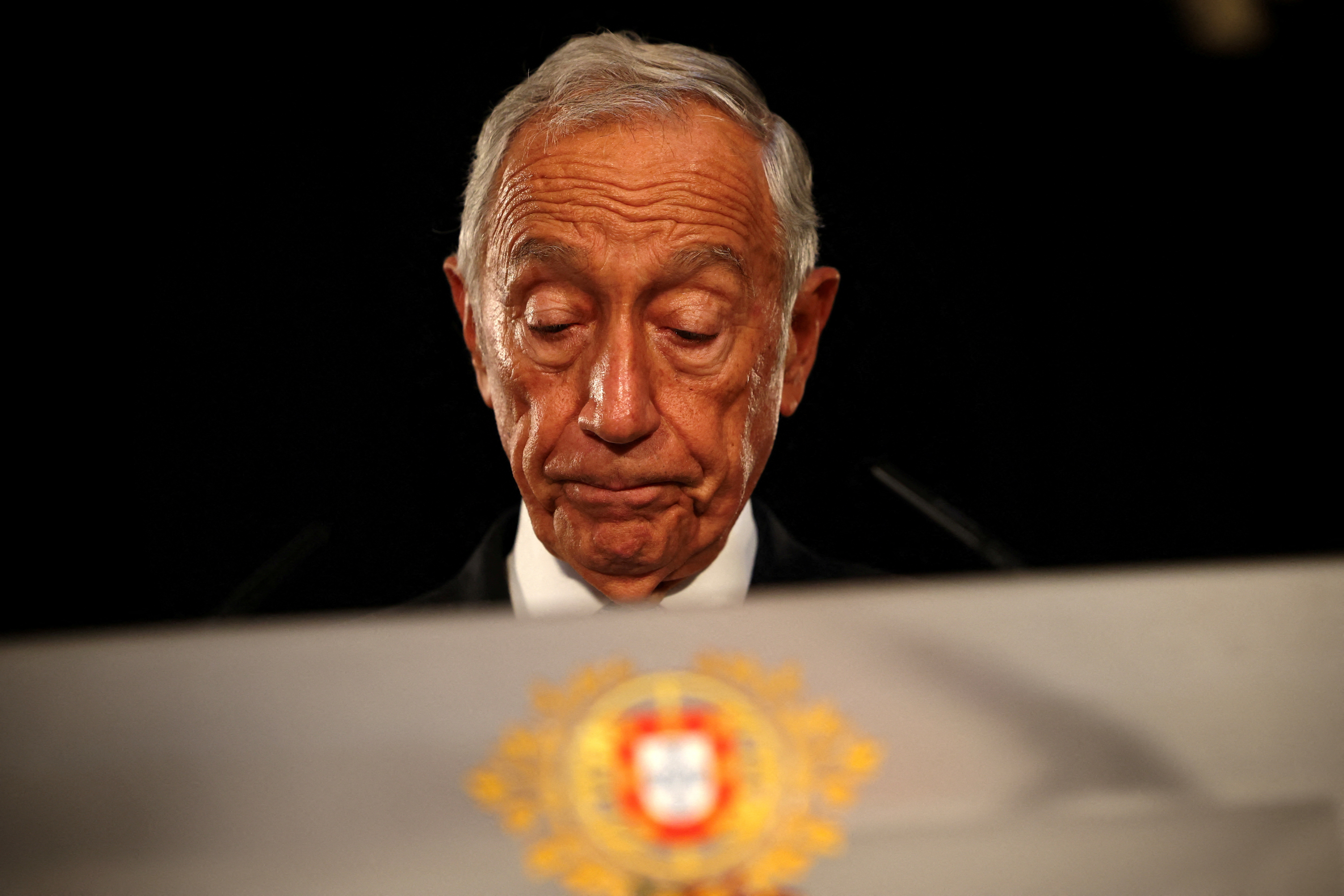 FILE PHOTO: Portugal's President de Sousa addresses the nation from Belem Palace to announce his decision to dissolve parliament, in Lisbon