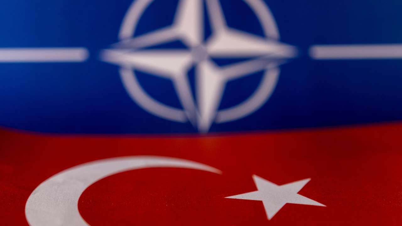 Illustration shows NATO and Turkish flags