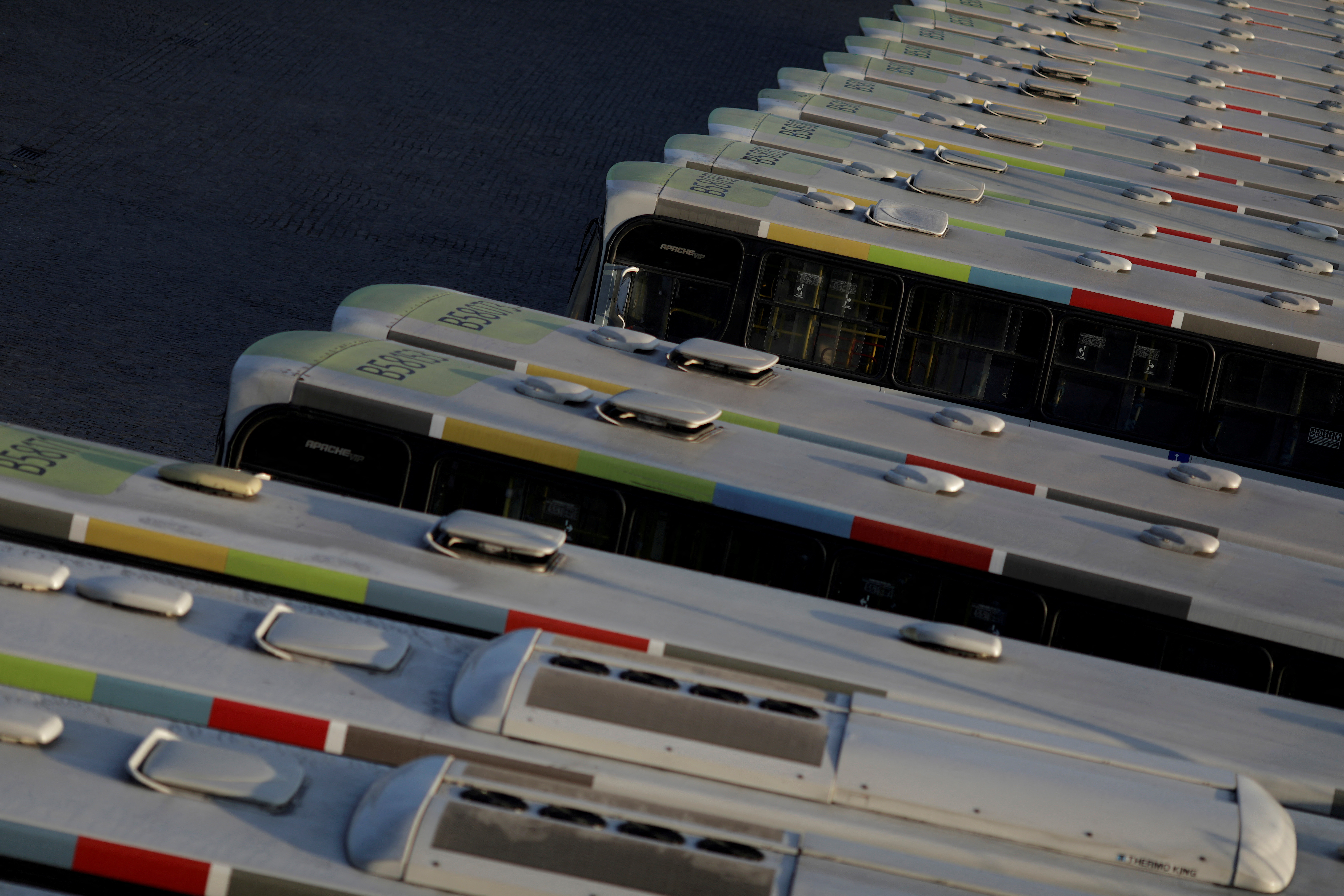 FILE PHOTO: Public buses are pictured parked at their company garage in Rio de Janeiro