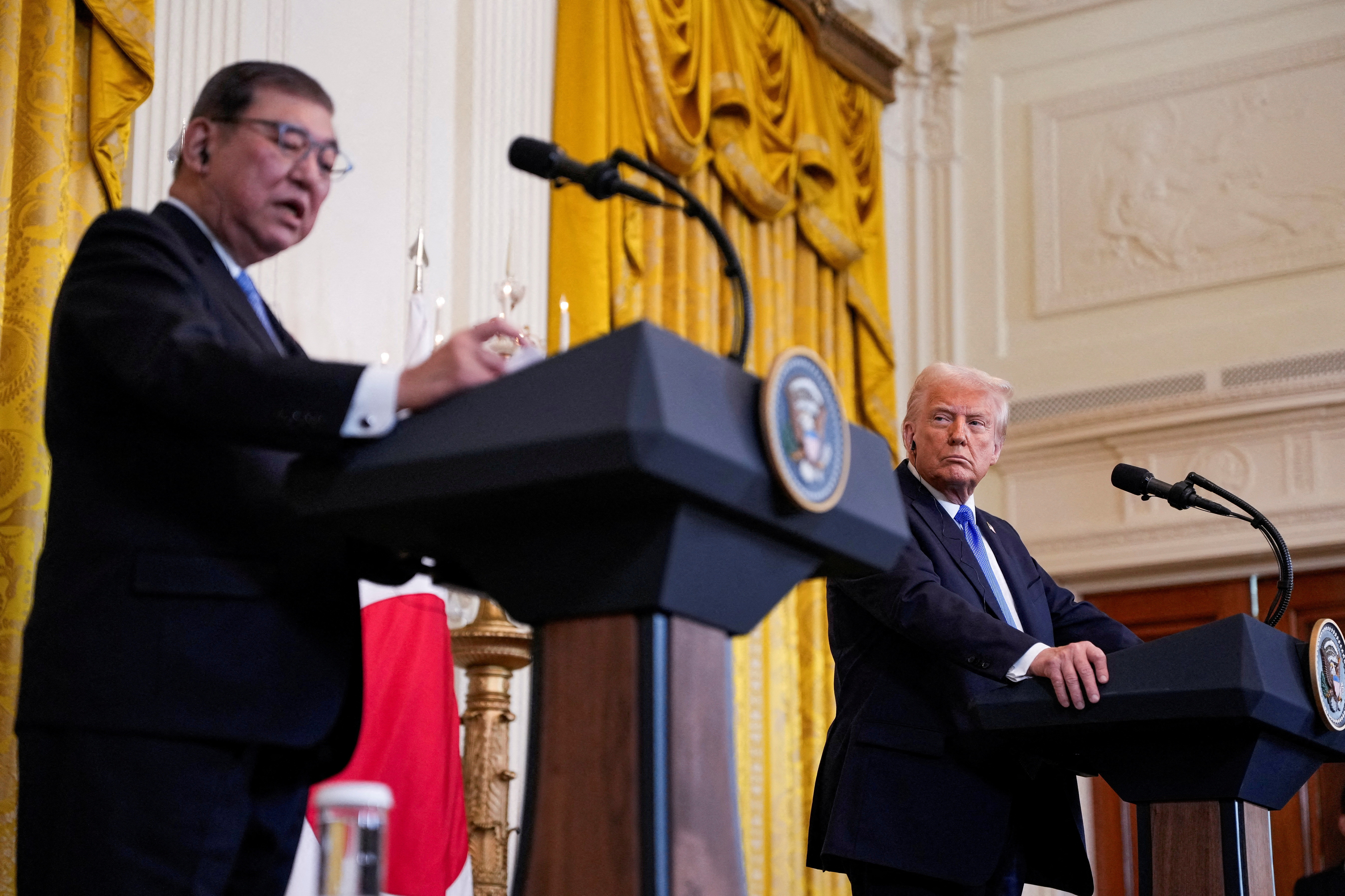 FILE PHOTO: U.S. President Donald Trump meets with Japan's Prime Minister Shigeru Ishiba at the White House
