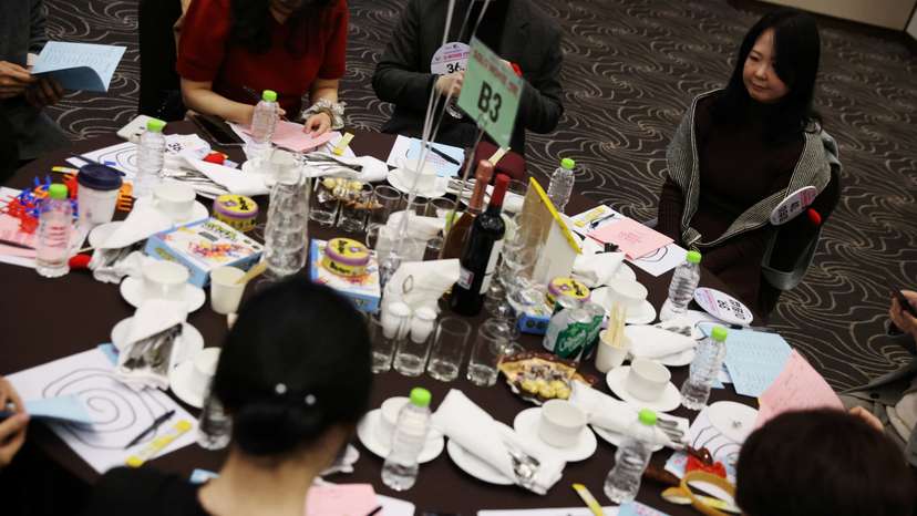 Lee Yu-mi sits along with other participants during a mass blind date event in Seongnam