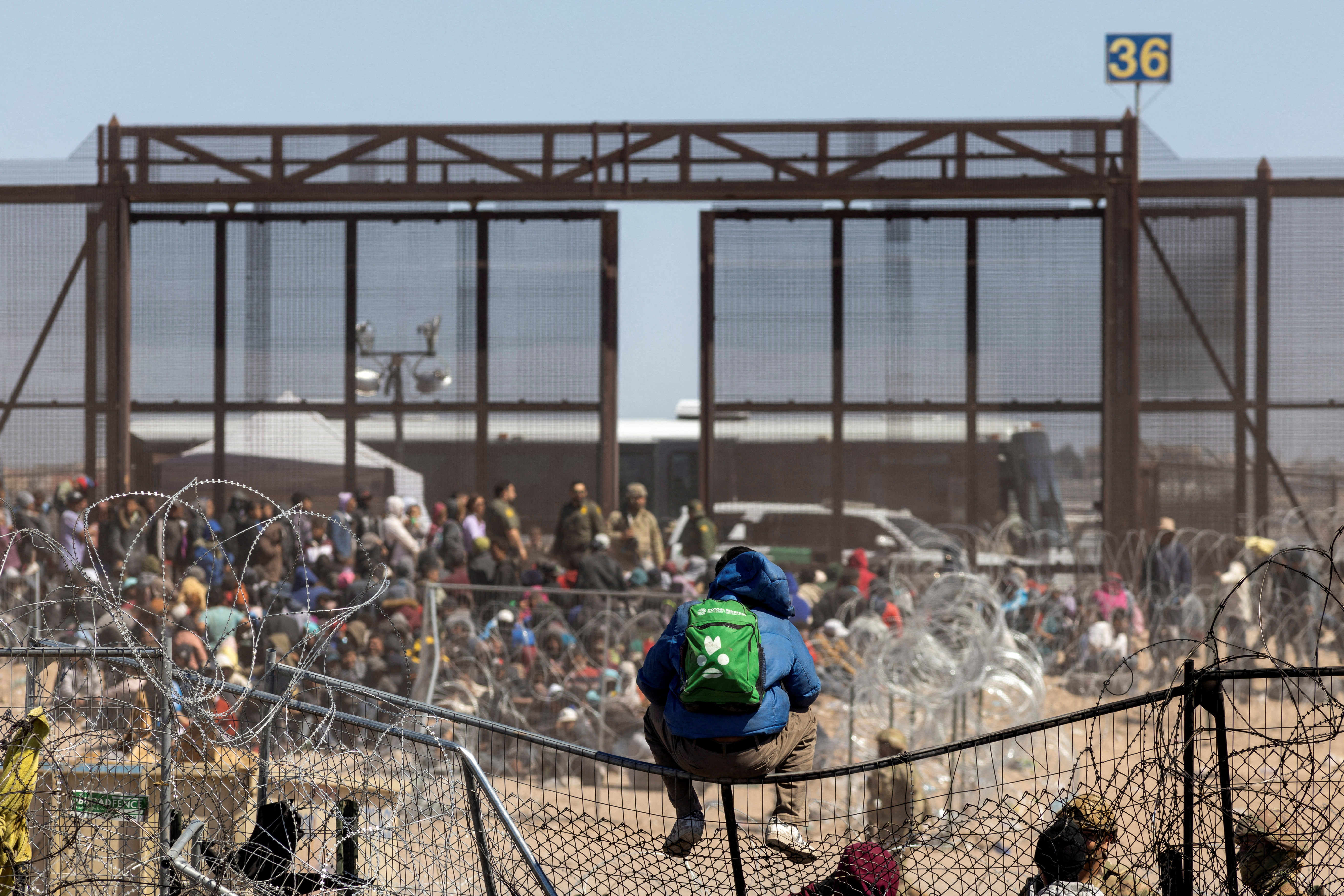 FILE PHOTO: Migrants cross into the U.S. as seen from Ciudad Juarez
