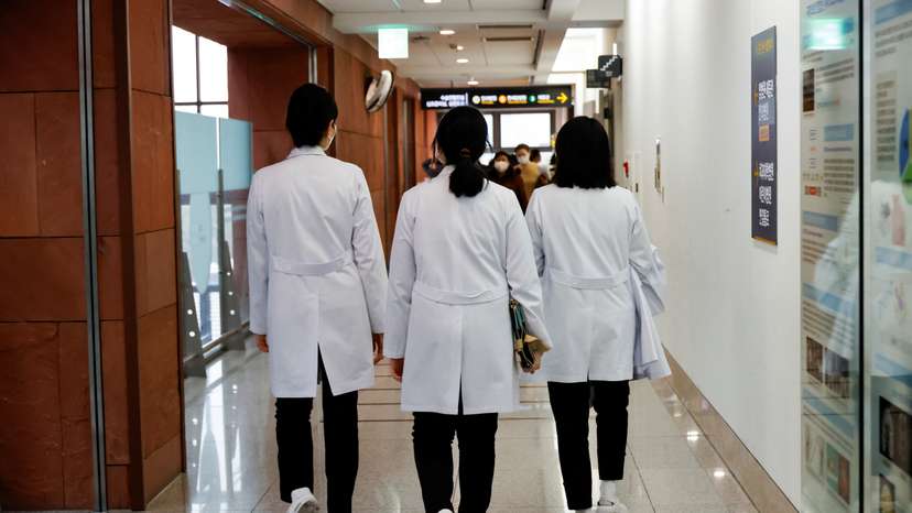 fMedical workers walk at Severance Hospital in Seoul