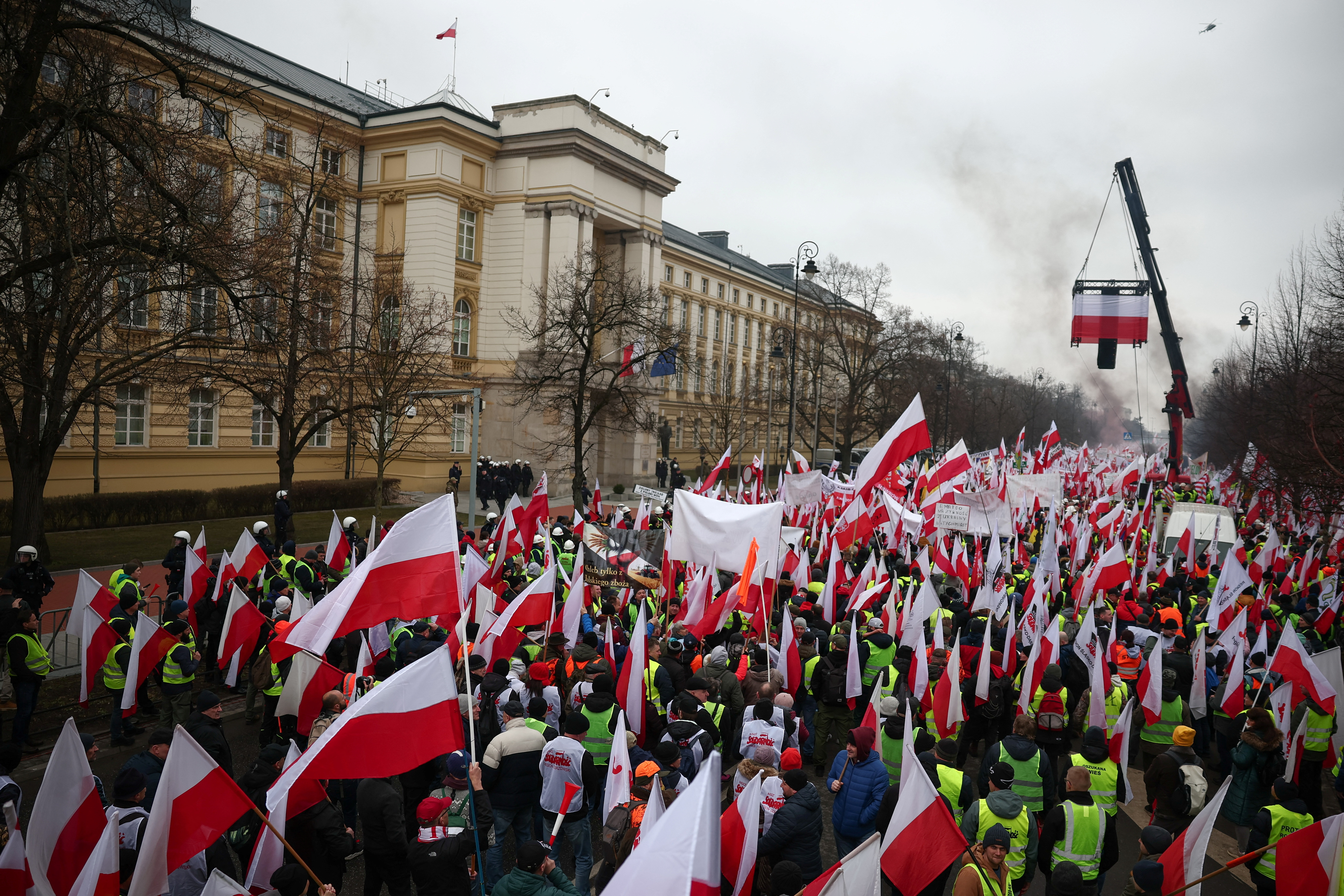 FILE PHOTO: Farmers protest outside Polish PM Tusk's office in Warsaw