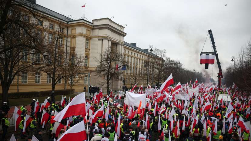 FILE PHOTO: Farmers protest outside Polish PM Tusk's office in Warsaw