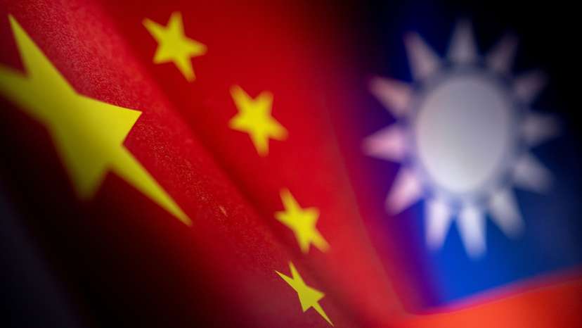 Illustration shows Chinese and Taiwanese flags