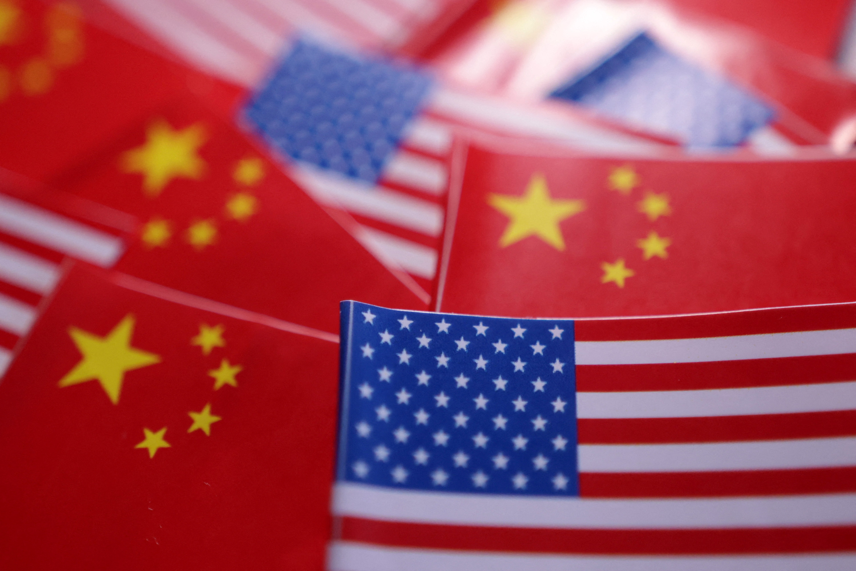 Illustration shows U.S. and Chinese flags
