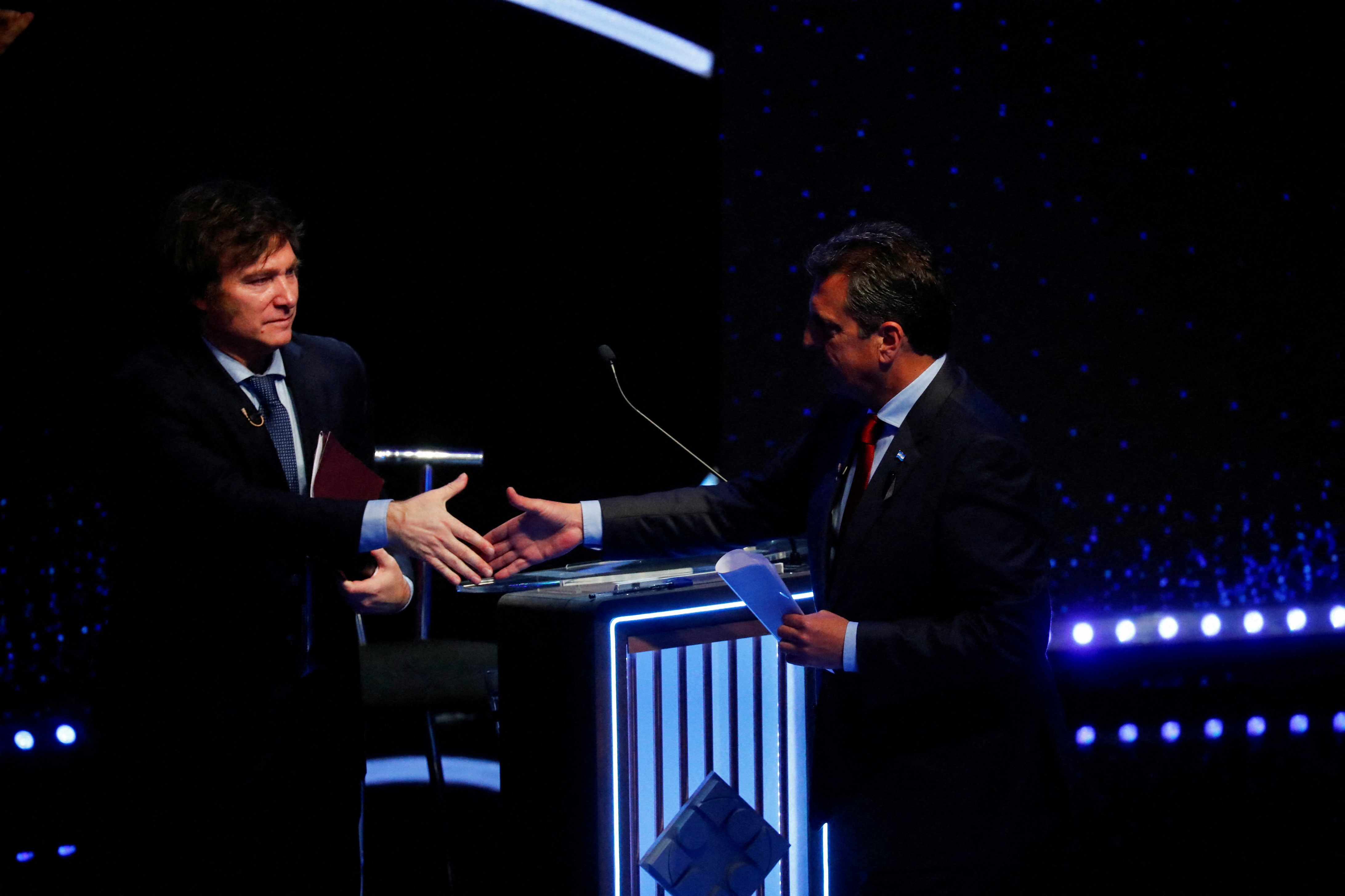 FILE PHOTO: Argentine presidential candidates take part in the final TV debate ahead of the October 22 general election, in Buenos Aires