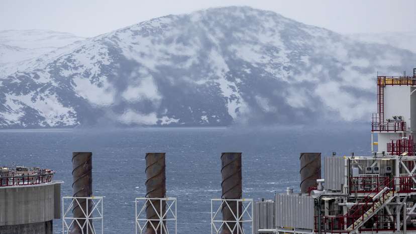 FILE PHOTO: Emissions are seen from chimneys, in Hammerfest