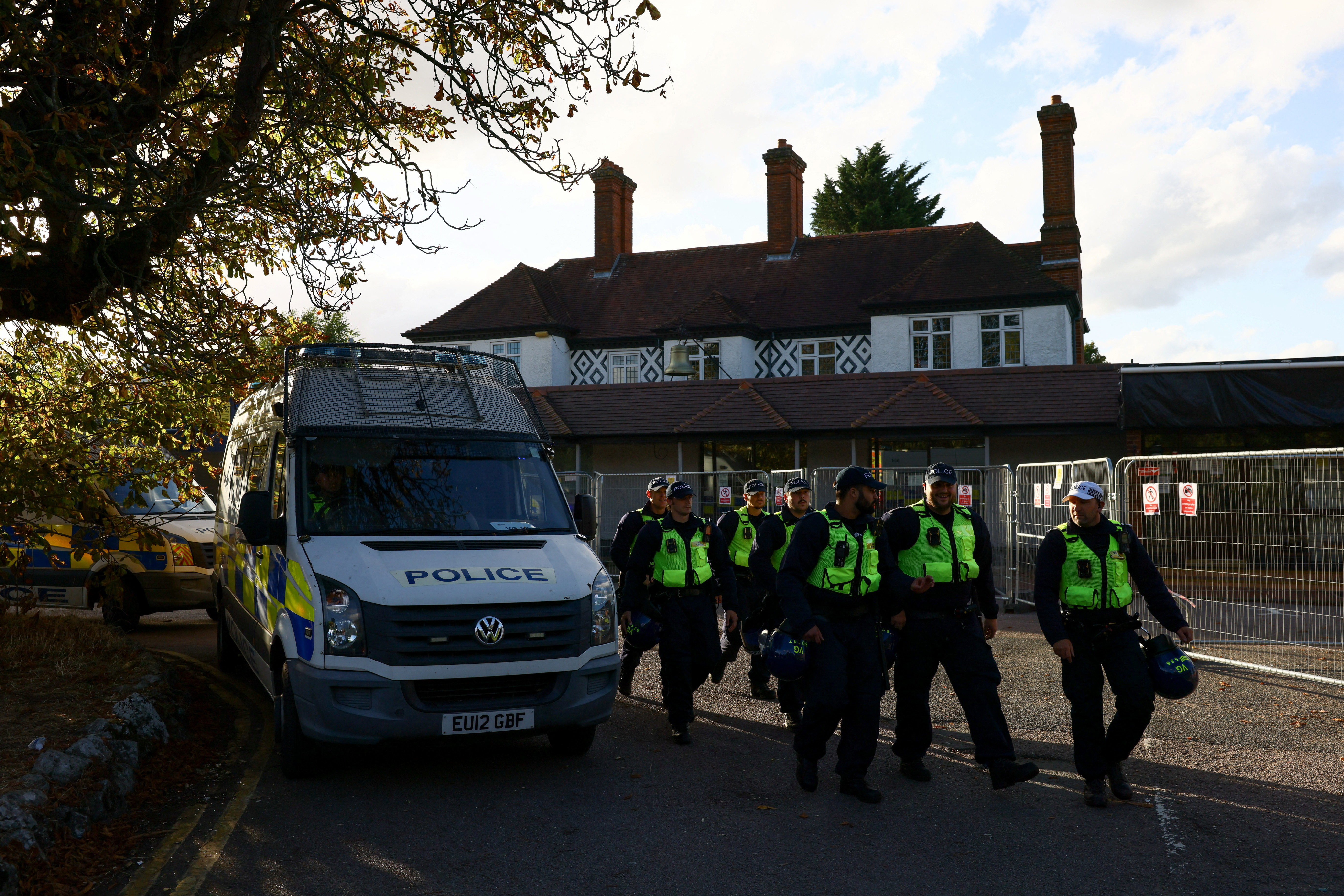 Protesters attend an anti-immigration demonstration outside The Bell Hotel, in Epping