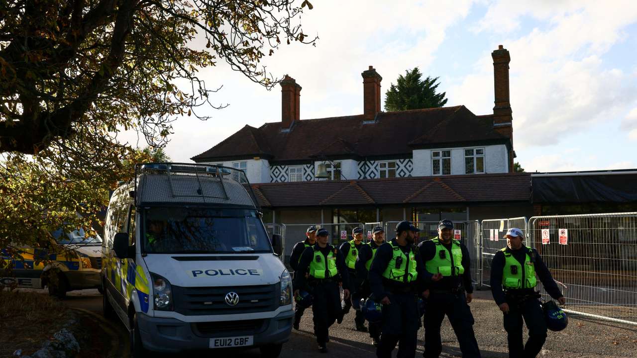 Protesters attend an anti-immigration demonstration outside The Bell Hotel, in Epping