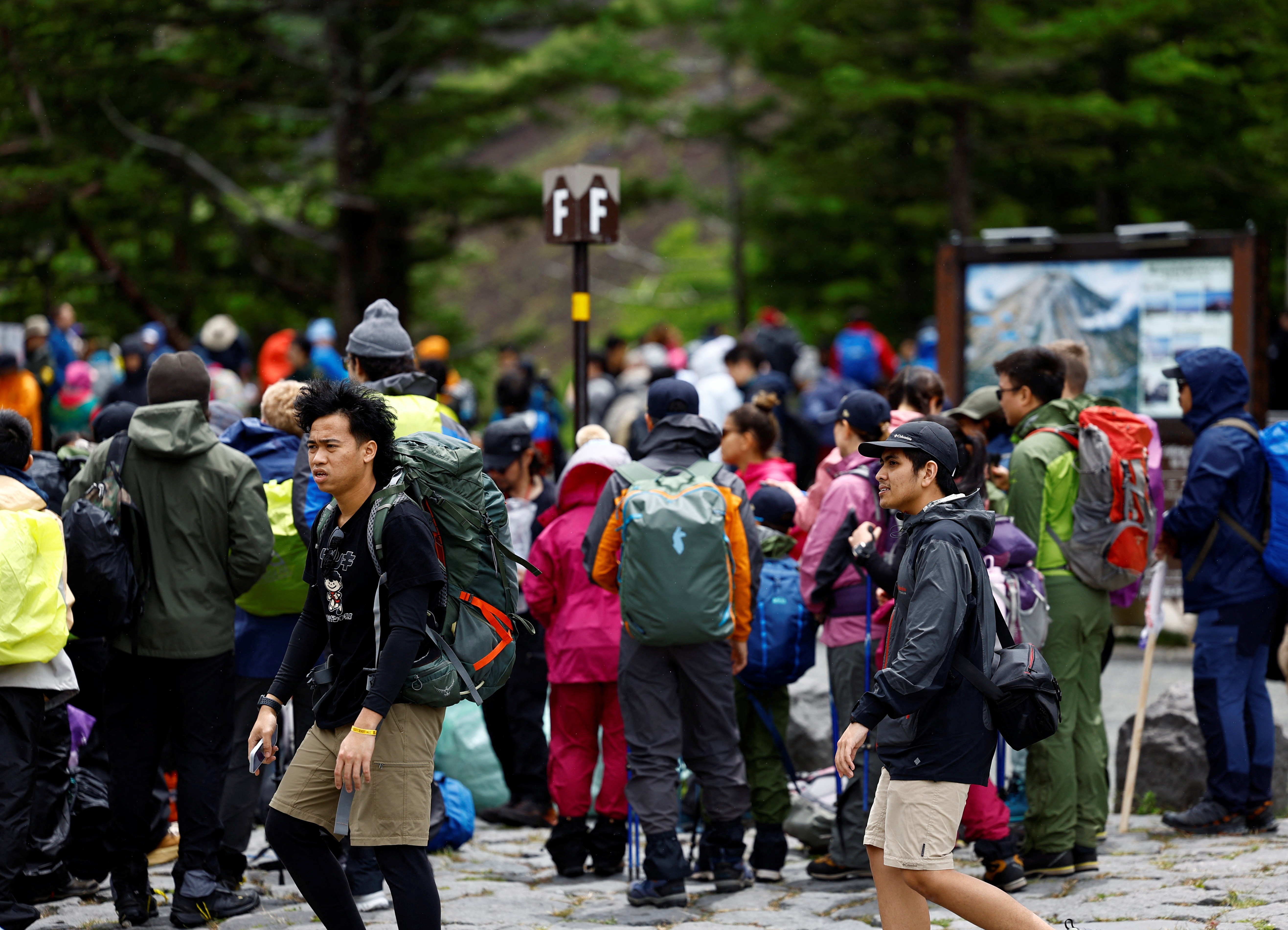 Mount Fuji climbing season starts with new entrance fee as a part of series of trial restrictions to curb overtourism in Fujiyoshida, Japan