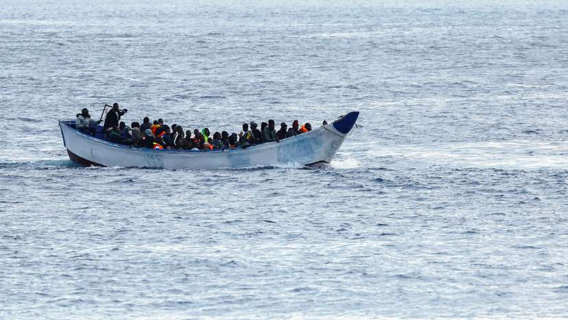 A fibreglass boat with migrants si seen arriving at the port of La Restinga on the island of El Hierro