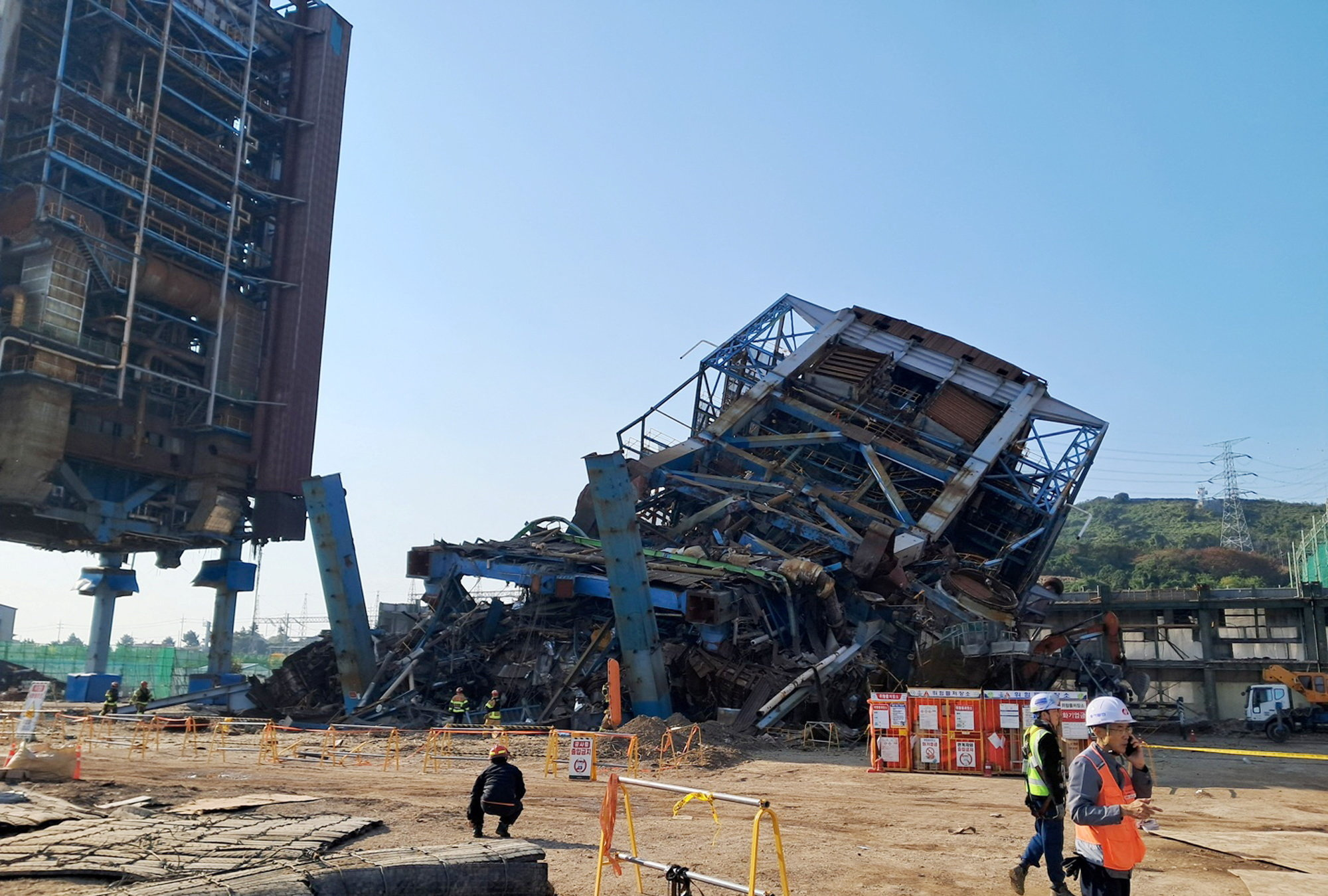 Multiple people believed trapped at South Korea power plant under collapsed structure, Yonhap says