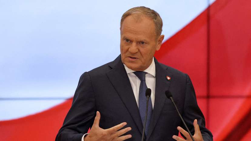 FILE PHOTO: Polish Prime Minister Donald Tusk speaks during a press conference