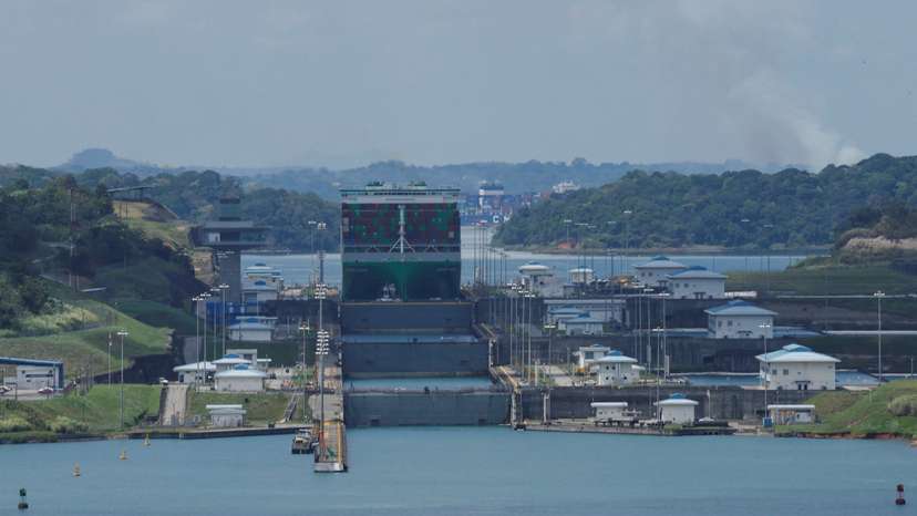 Cargo vessels transit through the Panama Canal, in Colon