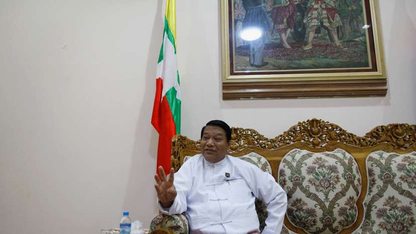 FILE PHOTO: Myanmar's Minister of Immigration and Population Khin Yi talks during an Reuters interview at his office in Naypyitaw