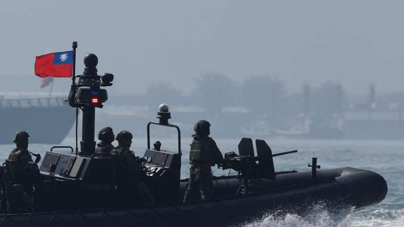 Members of Taiwan's Navy in a drill part of a demonstration for the media at a navy base in Kaohsiung