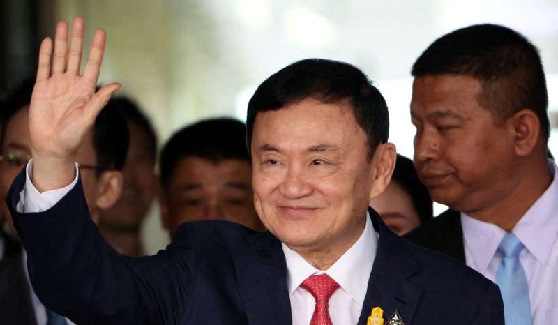 FILE PHOTO: Exiled former PM Thaksin returns to Thailand