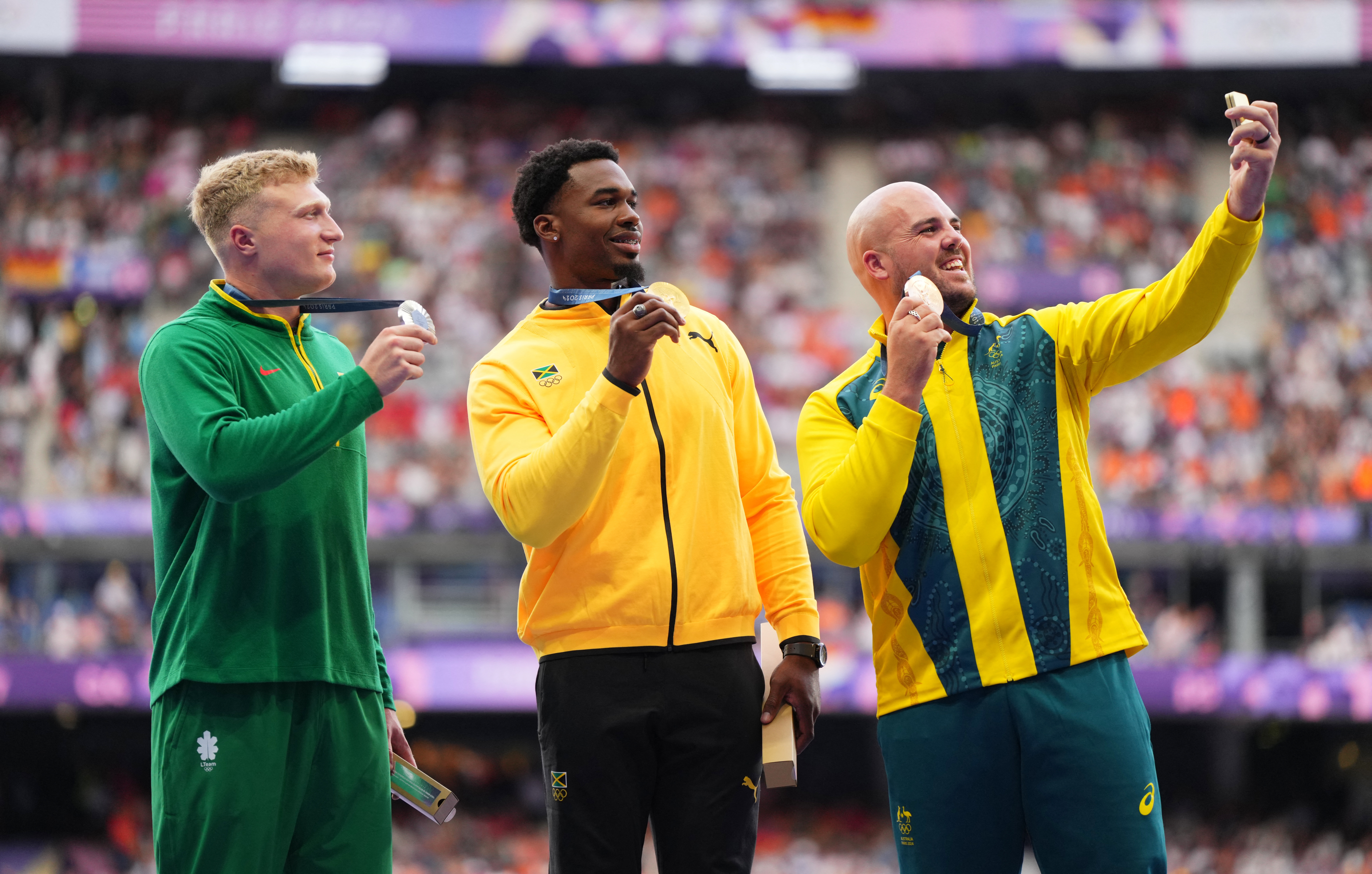 Athletics - Men's Discus Throw Victory Ceremony