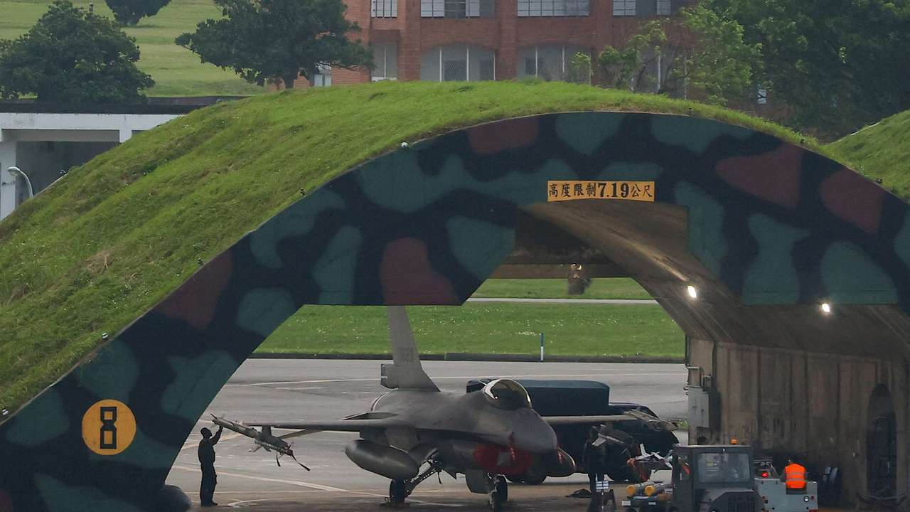FILE PHOTO: A technician works on an F-16 at an air force base in Hualien