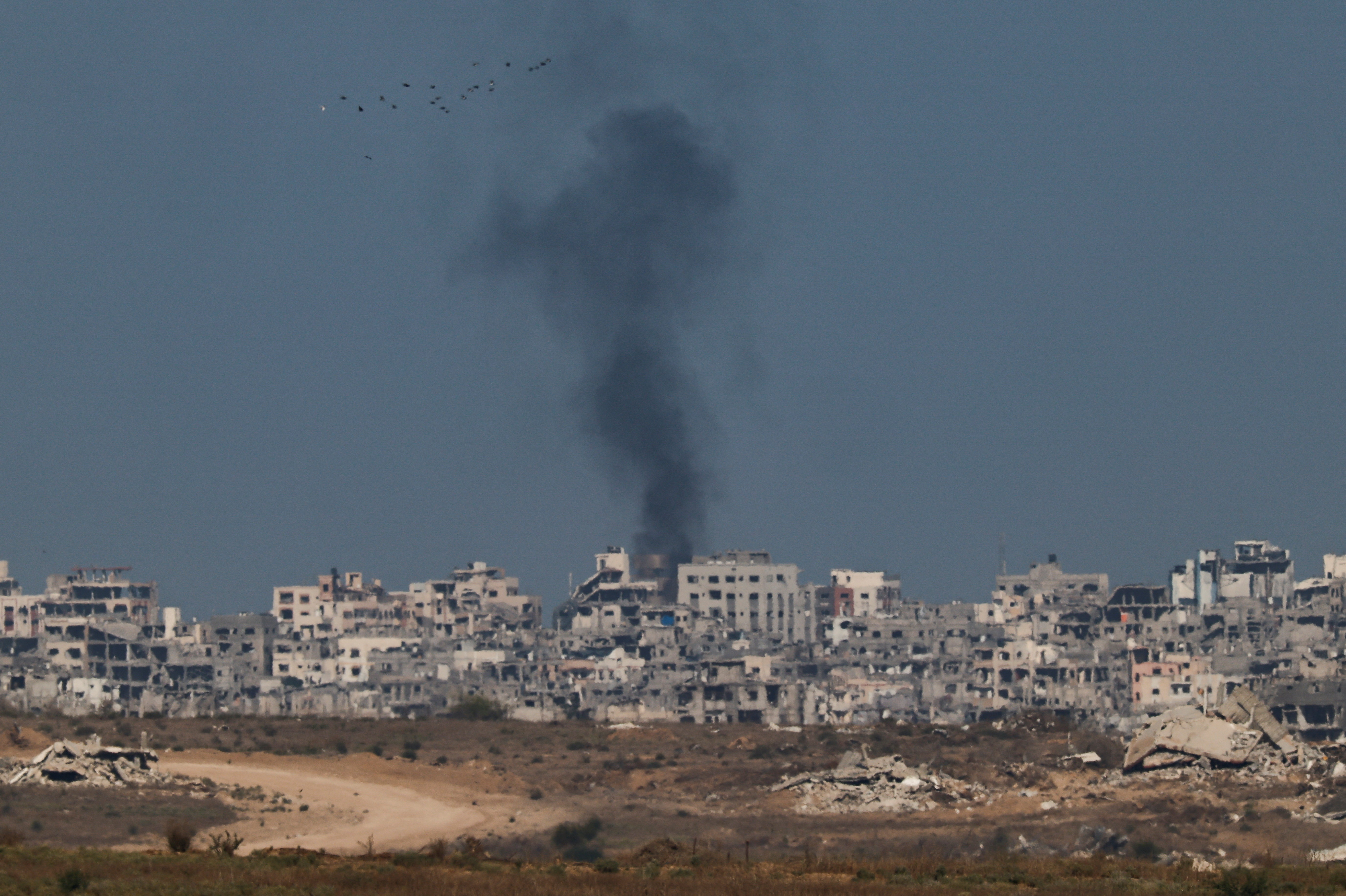 Smoke rises from Gaza as seen from the Israeli side of the border