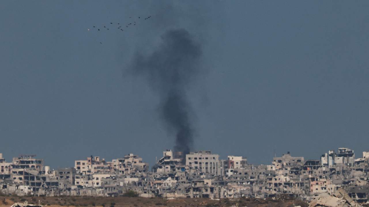 Smoke rises from Gaza as seen from the Israeli side of the border